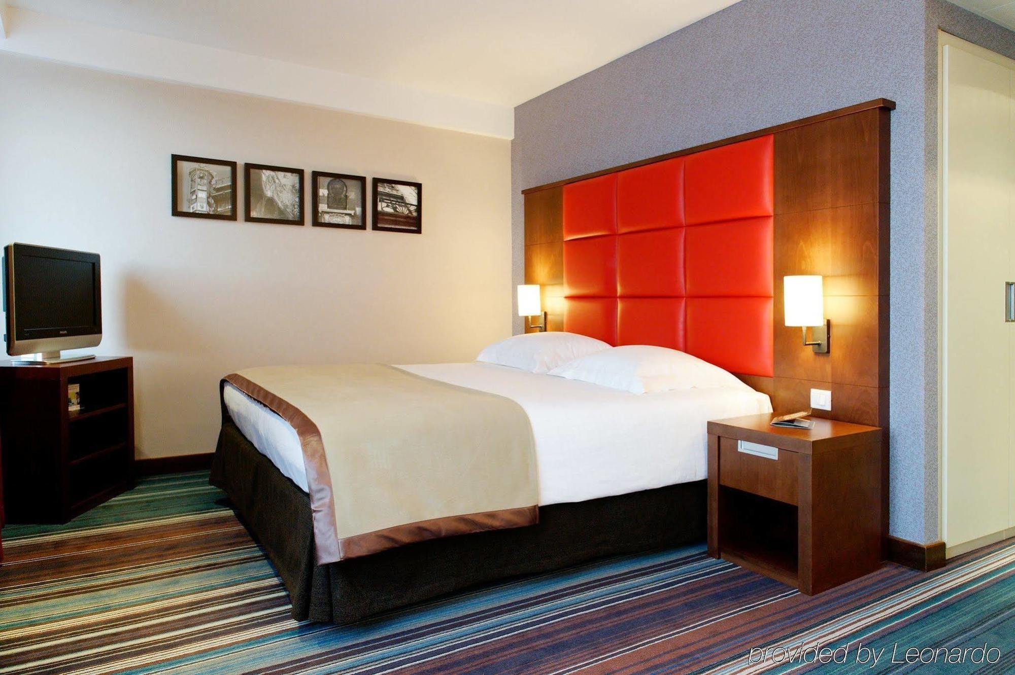 นิวโฮเต็ล ชาร์เลอมาคเนอ Hotel บรัสเซลส์ ห้อง รูปภาพ